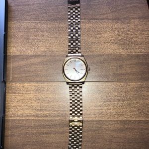 Rose Gold and Black Nixon Watches